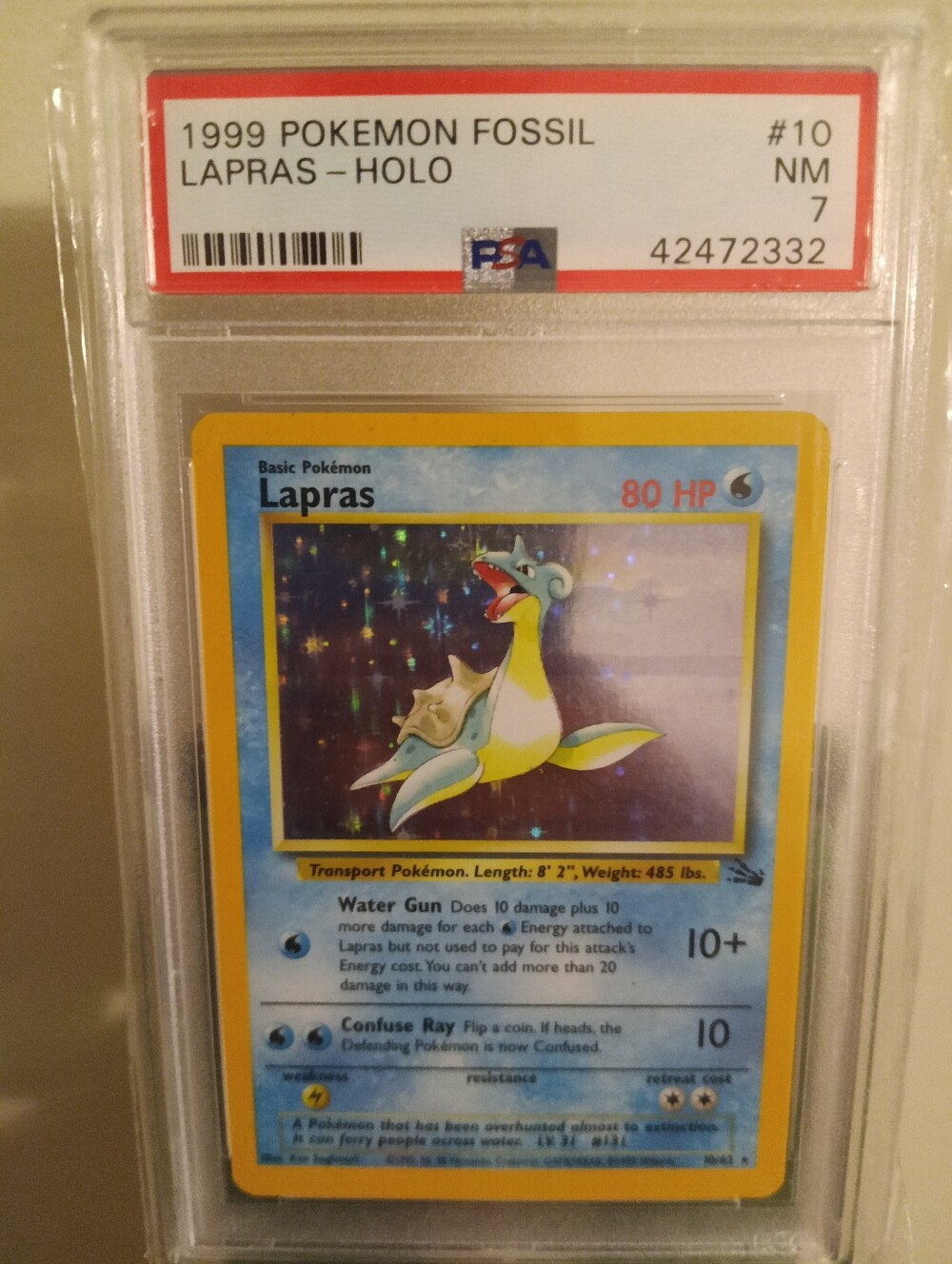 1999 POKEMON FOSSIL #10 LAPRAS-HOLO PSA 7